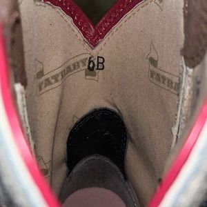 Brown Fatbaby Ariat boots.